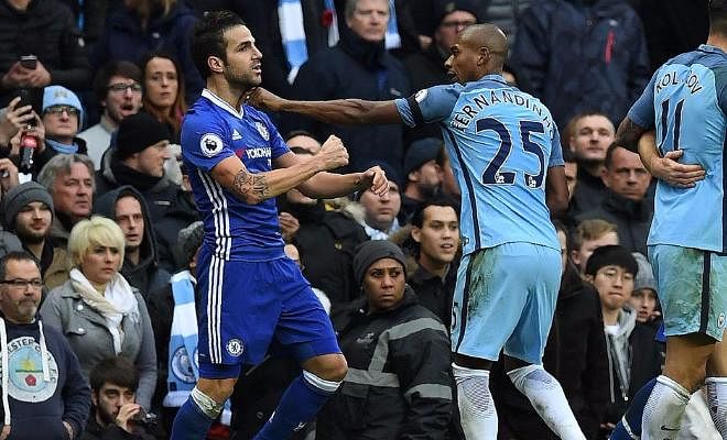  Fernandinho is bound to be banned for at least three games after recieving a red card on the spot for grabbing Cesc Fabregas by the throat. The Spanish midfielder was given a yellow but FA are waiting to find out if it was for the slap. If referee Taylor says it wasn’t, then the FA are likely to charge Fabregas retrospectively with violent conduct.