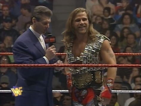 Vince McMahon conducts an in-ring interview with Shawn Michaels.