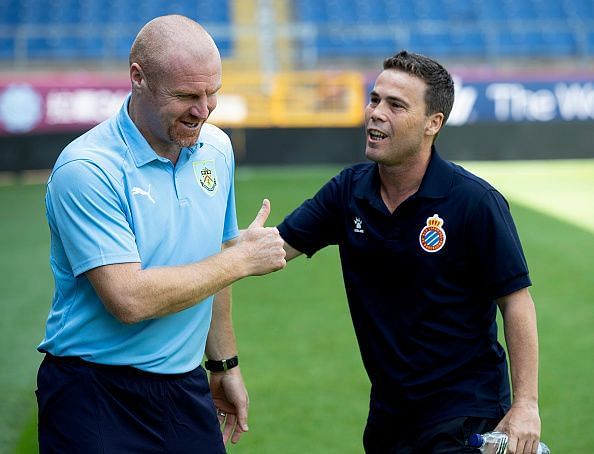 Espanyol manager Rubi (right) chats with Sean Dyche ahead of a pre-season match against Burnley