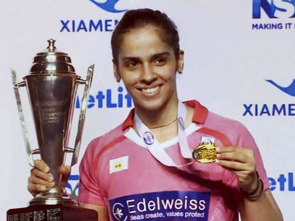 Saina Nehwal with the Australian open Superseries trophy and medal