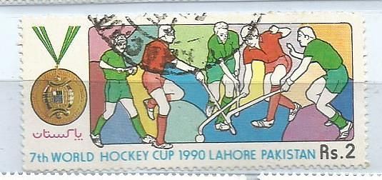 A STAMP ISSUED BY PAKISTAN IN 1990 ON 7TH WORLD CUP HOCKEY