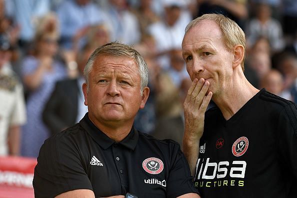 The divide is evident even on the managerial front. Image: Chris Wilder (left) and Alan Knill of United