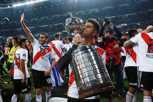 Real Madrid transfer target Exequiel Palacios with the trophy