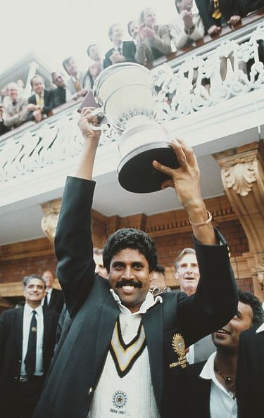 India Captain Kapil Dev holds aloft the 1983 World Cup