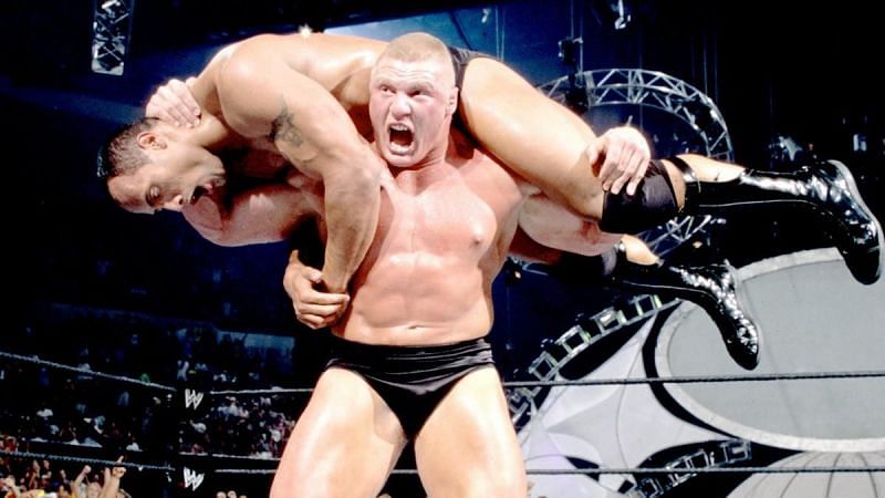 Lesnar flattens the Great One to be the youngest WWE Champion ever.