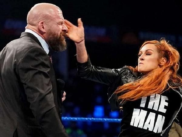 Becky delivers a slap to The Game