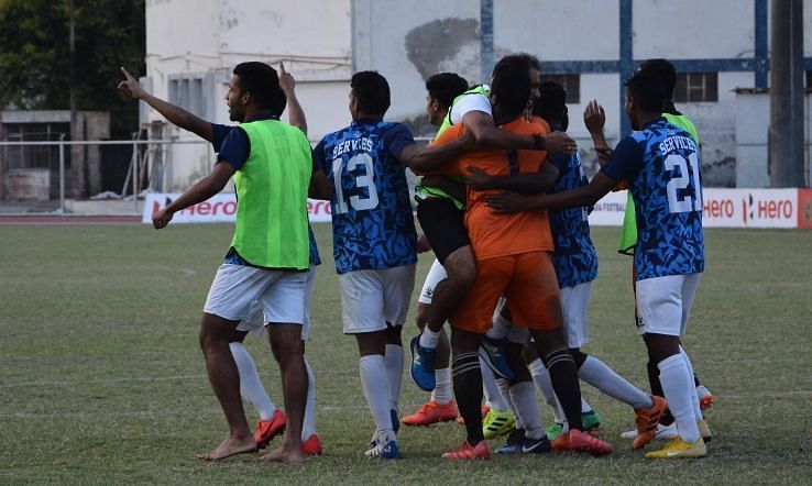 Services&#039; players celebrate after their win over Karnataka in the Santosh Trophy