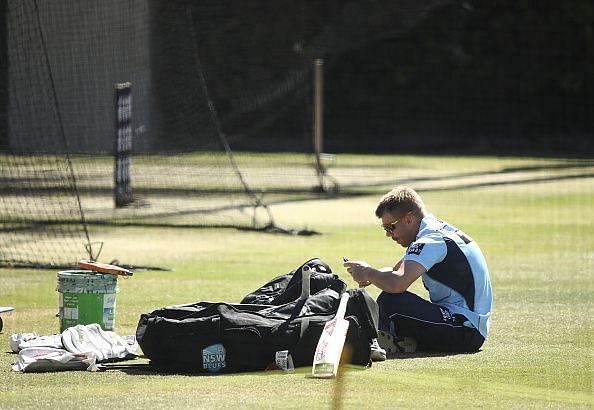 David Warner with his bags in days before his 12 month ban from cricket for his role in 