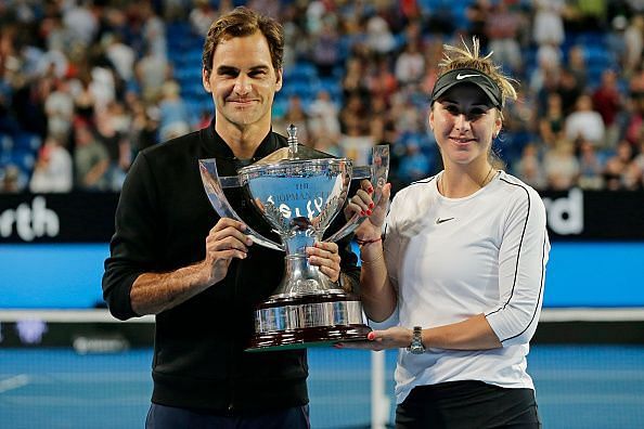 Roger Federer and Belinda Bencic after winning the 2019 Hopman Cup in Perth, Australia