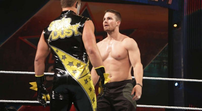 Stardust (Cody Rhodes) faces off with Stephen Amell (Green Arrow.)