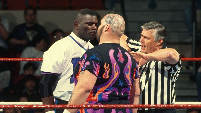 LT stands toe to toe with the Beast from the East, flanked by special referee Pat Patterson.
