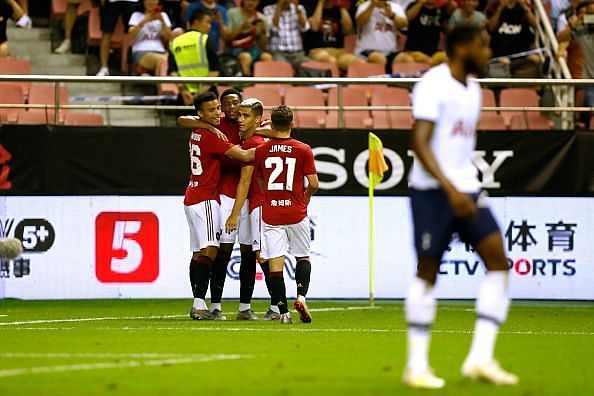 Manchester United celebrate a goal against Tottenham Hotspur.