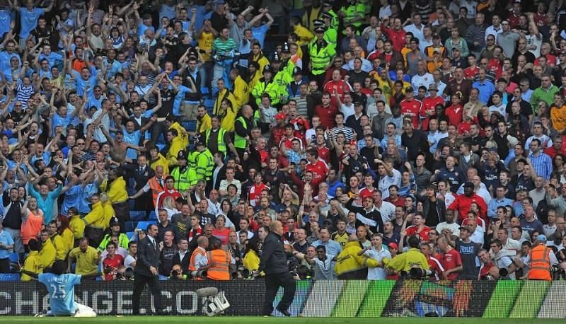 Emmanuel Adebayor found himself in trouble after running the length of the pitch to taunt the Arsenal fans in his celebration