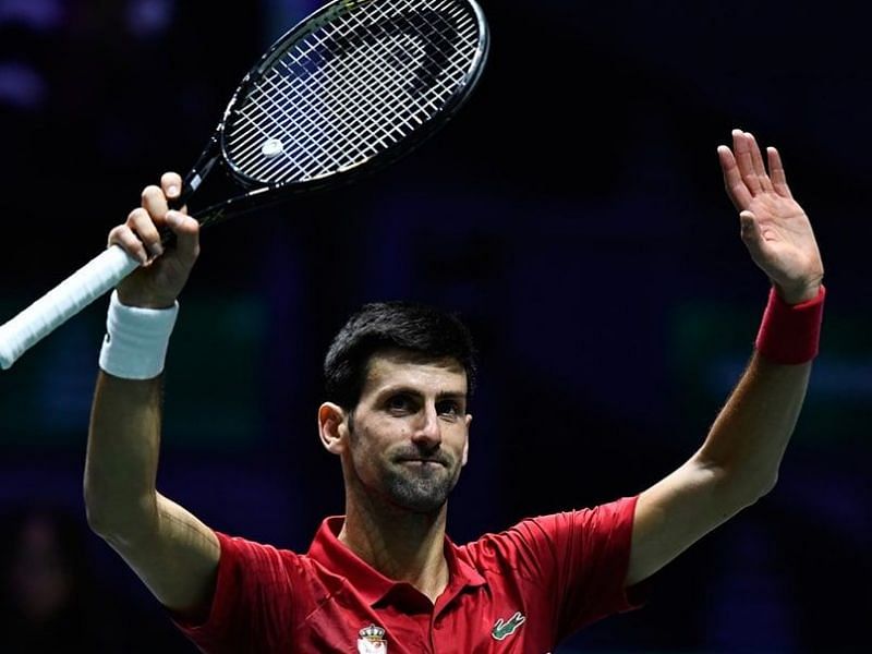 Novak Djokovic poses with his 2018 Cincinnati title