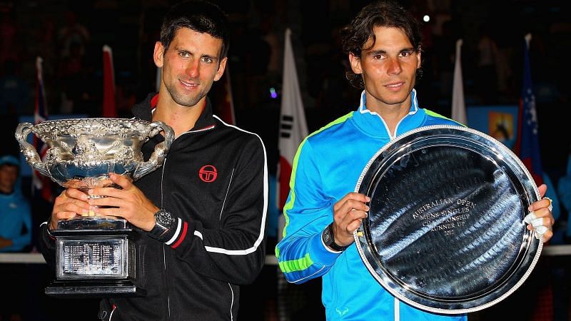 2012 Australian Open winner Novak Djokovic poses with Rafael Nadal