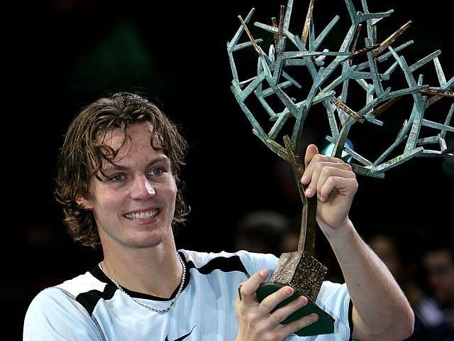 Tomas Berdych hoists aloft his lone Masters 1000 title at the 2005 Paris-Bercy Masters.