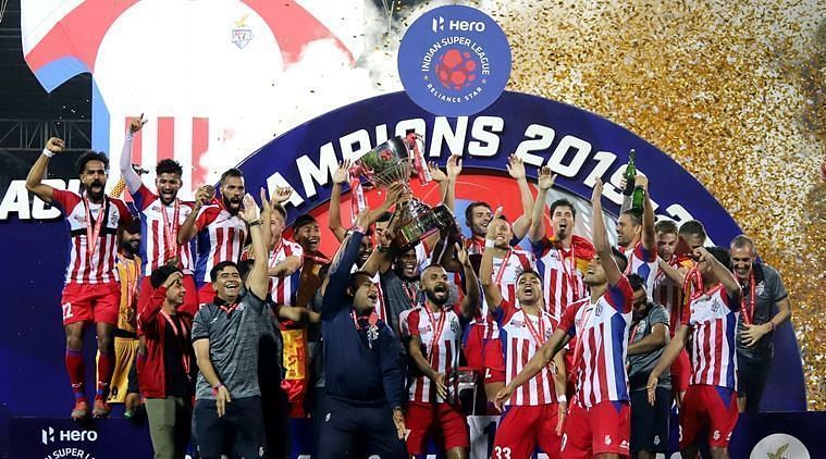 ATK players celebrate after lifting the ISL trophy