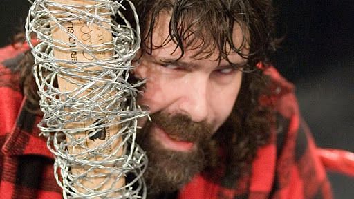 Mick Foley with his favorite weapon!
