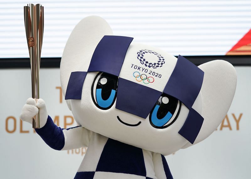 Tokyo Olympics mascot Miraitowa holding the Olympic torch