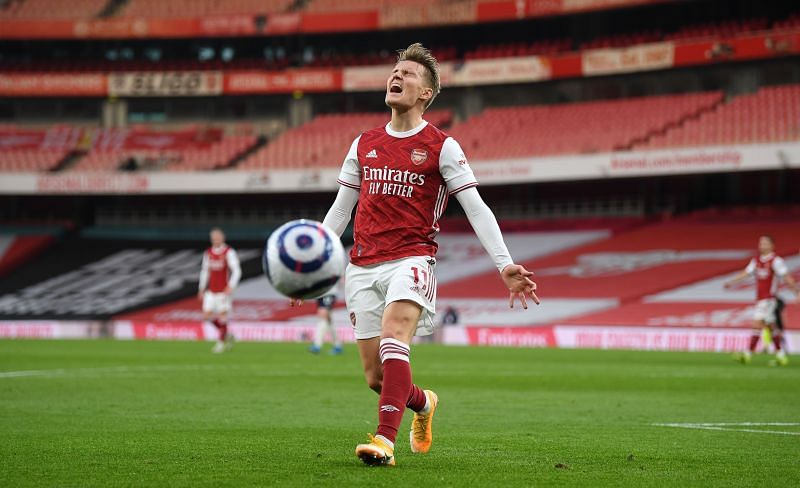 Martin Odegaard in Premier League action for Arsenal against Manchester City