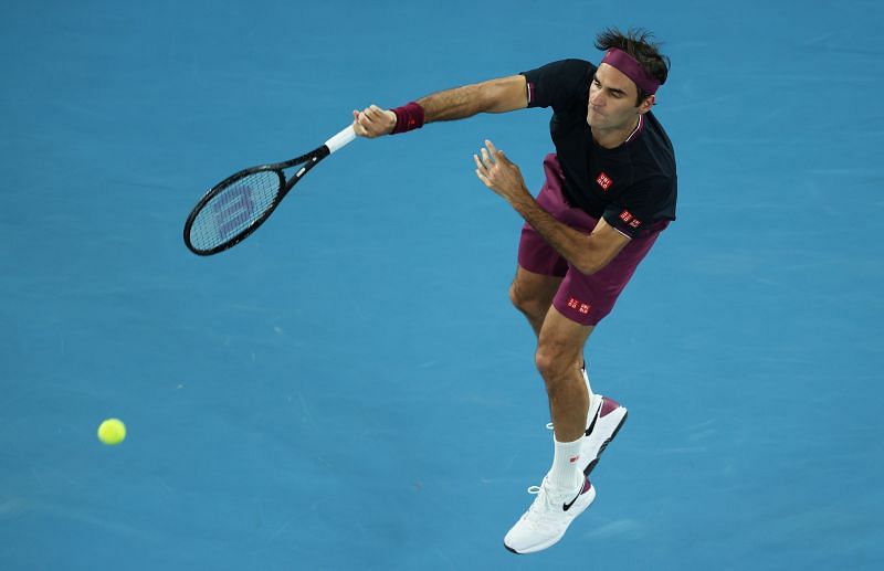 Roger Federer serves during the 2020 Australian Open.