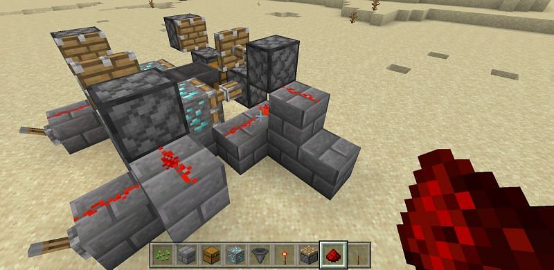 Finally you will place two sets of pistons on either side of your contraption slightly above your diamond ore.