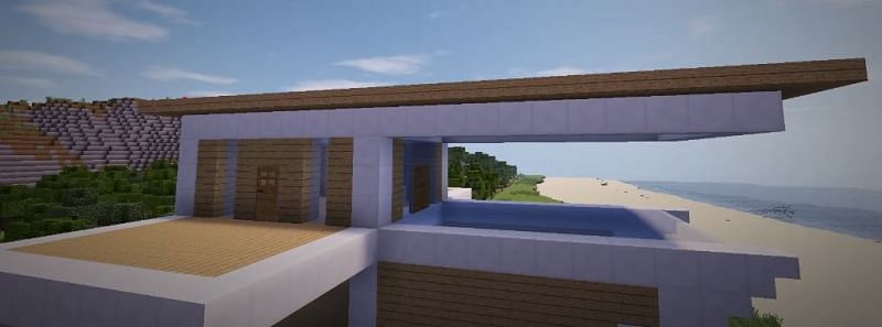 Players must now build the rooftop balcony of the mansion (Image via YT, Greg Builds)