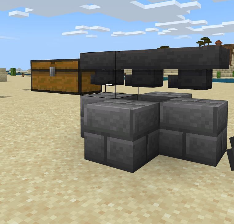 Next you will want to place three hoppers over the center of your construction and two sets of diamond ore one block away from the side that the chest is on.