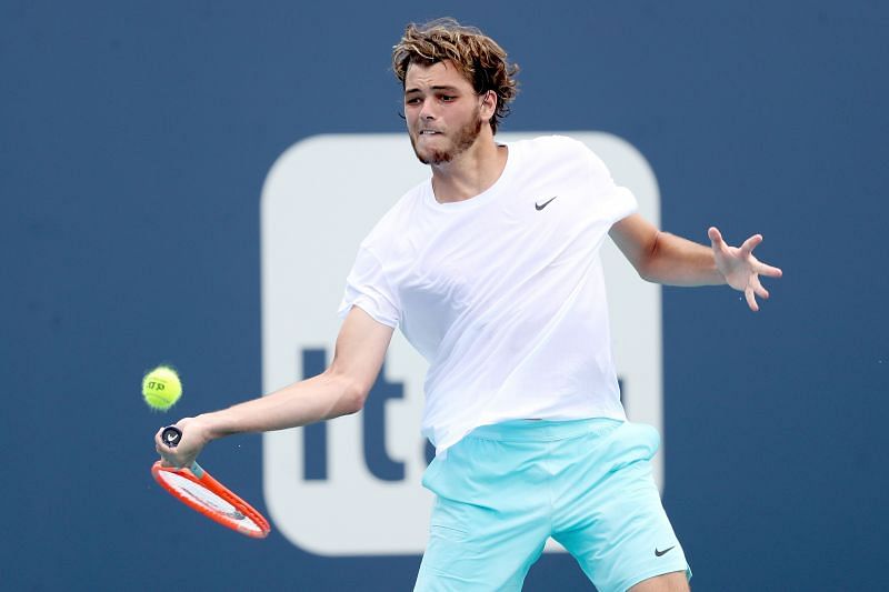 Taylor Fritz hits a forehand