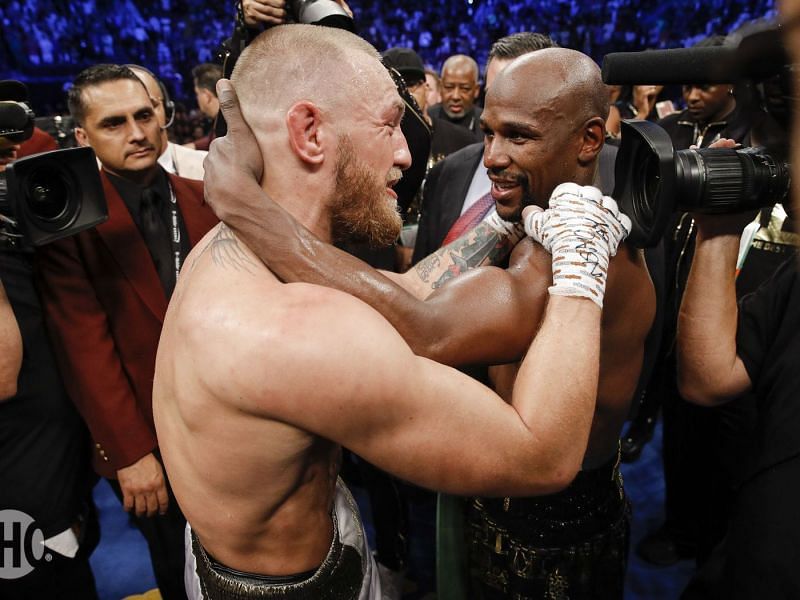 Conor McGregor and Floyd Mayweather hugging it out