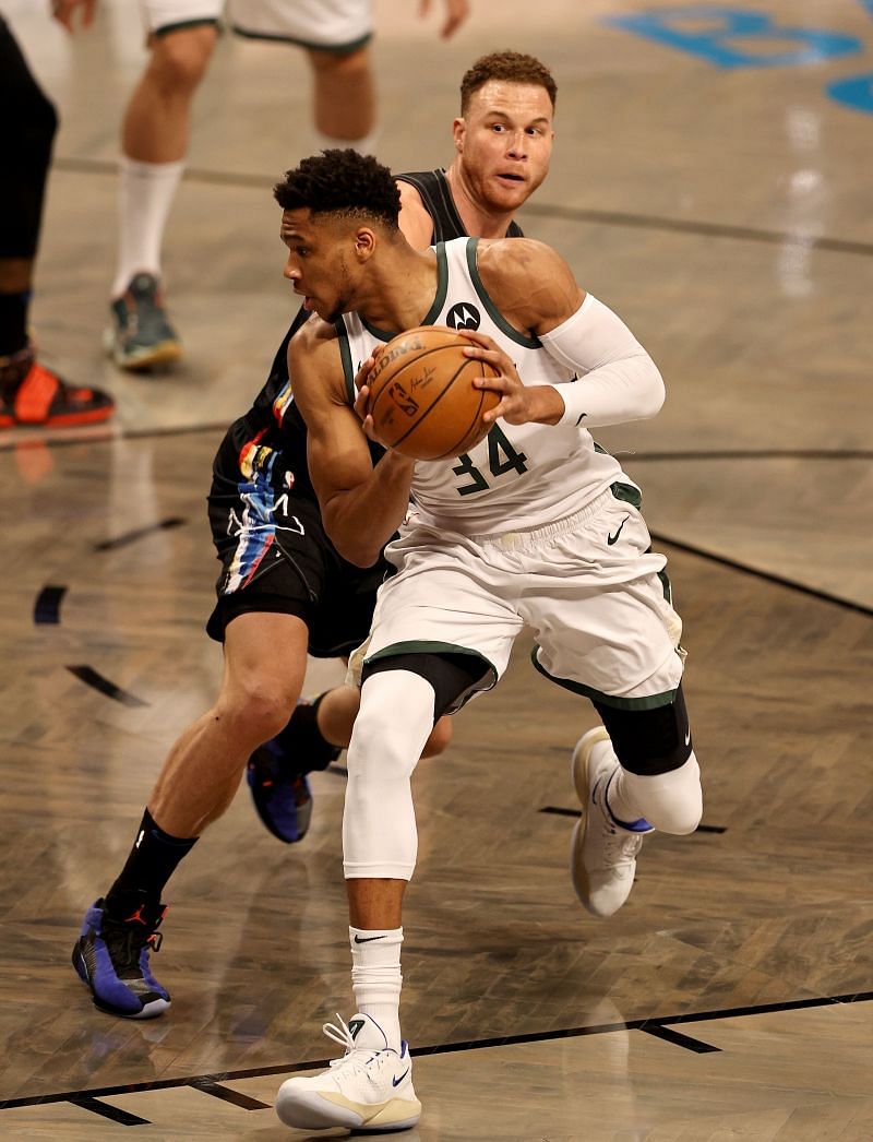 Giannis Antetokounmpo (#34) of the Milwaukee Bucks heads for the net as Blake Griffin (#2) of the Brooklyn Nets defends