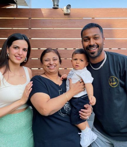 hardik Pandya with his wife and mother and his son
