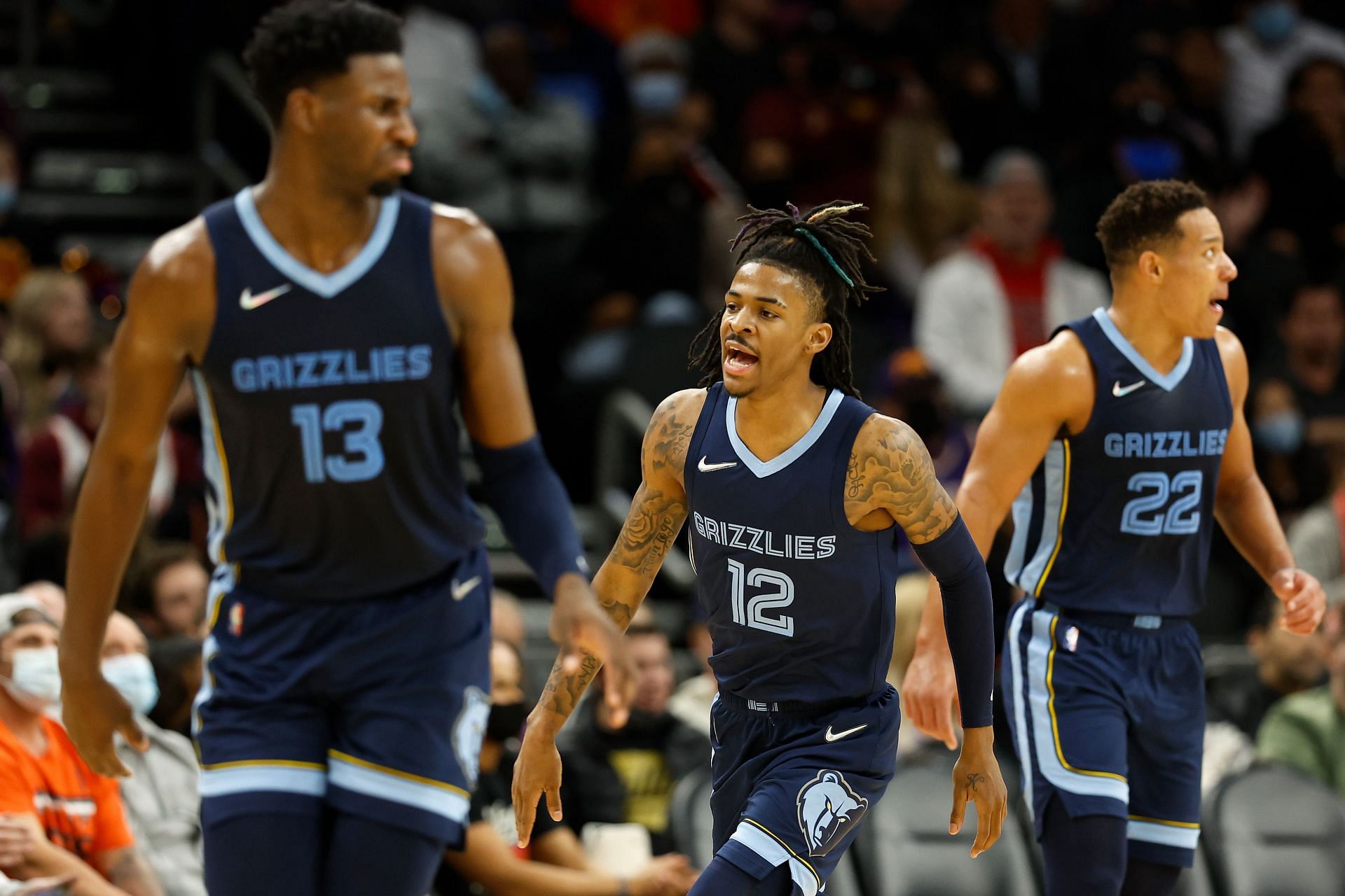 Ja Morant #12 of the Memphis Grizzlies reacts after scoring against the Phoenix Suns.