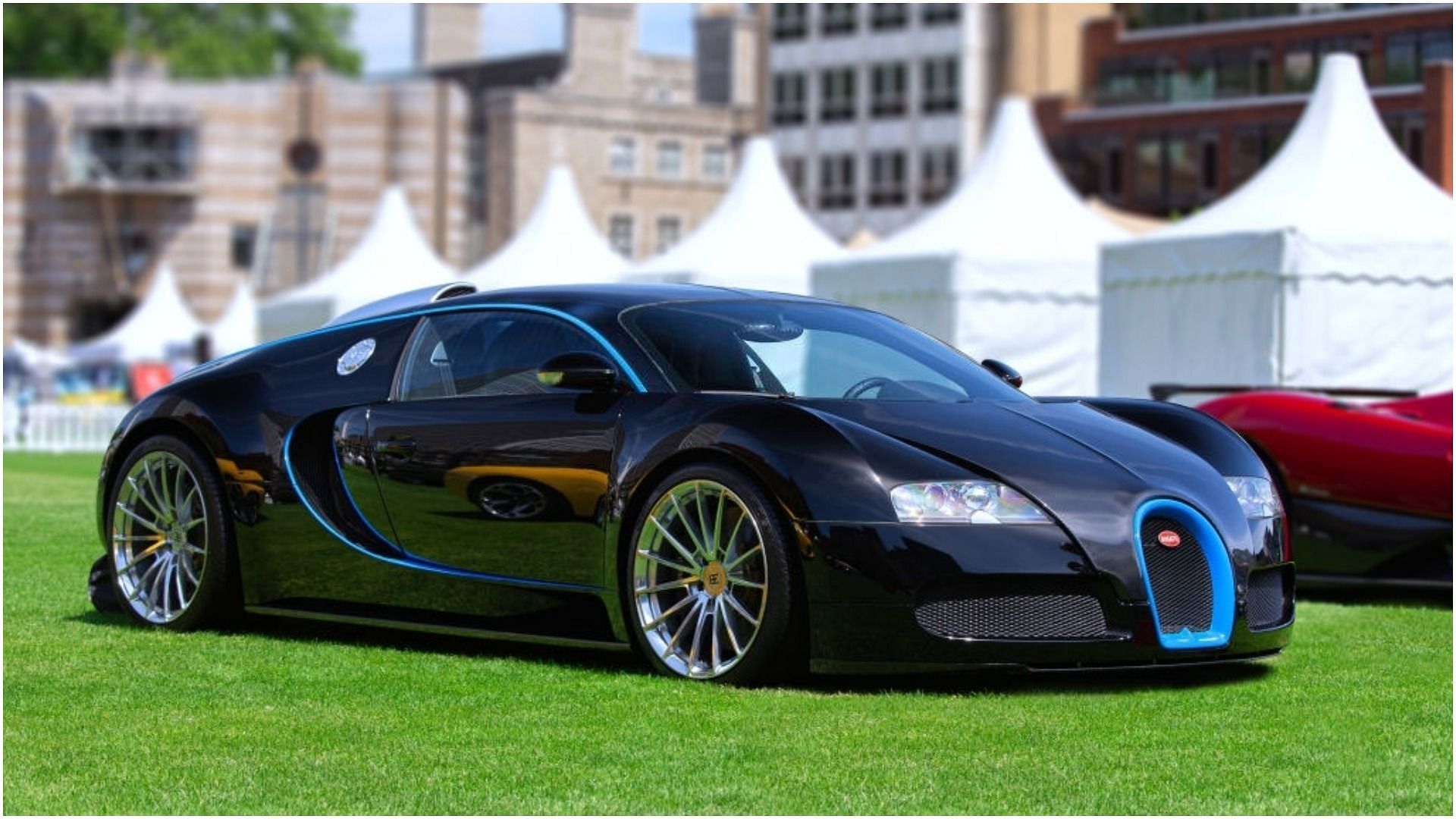 Sources say that Ye owns a Bugatti Veyron (Image via Martyn Lucy/Getty Images)