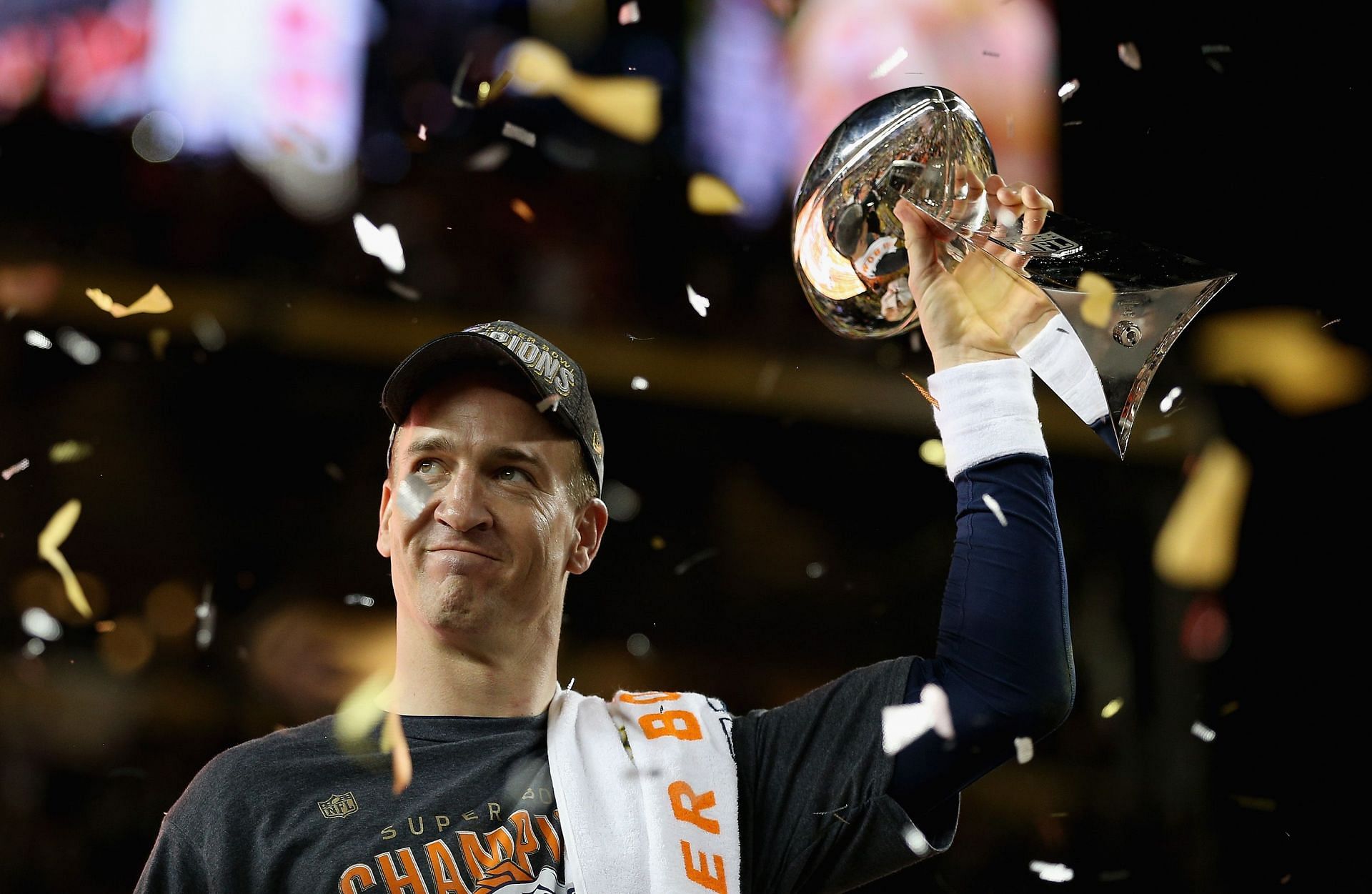 Peyton Manning lifting the Vince Lombardi trophy