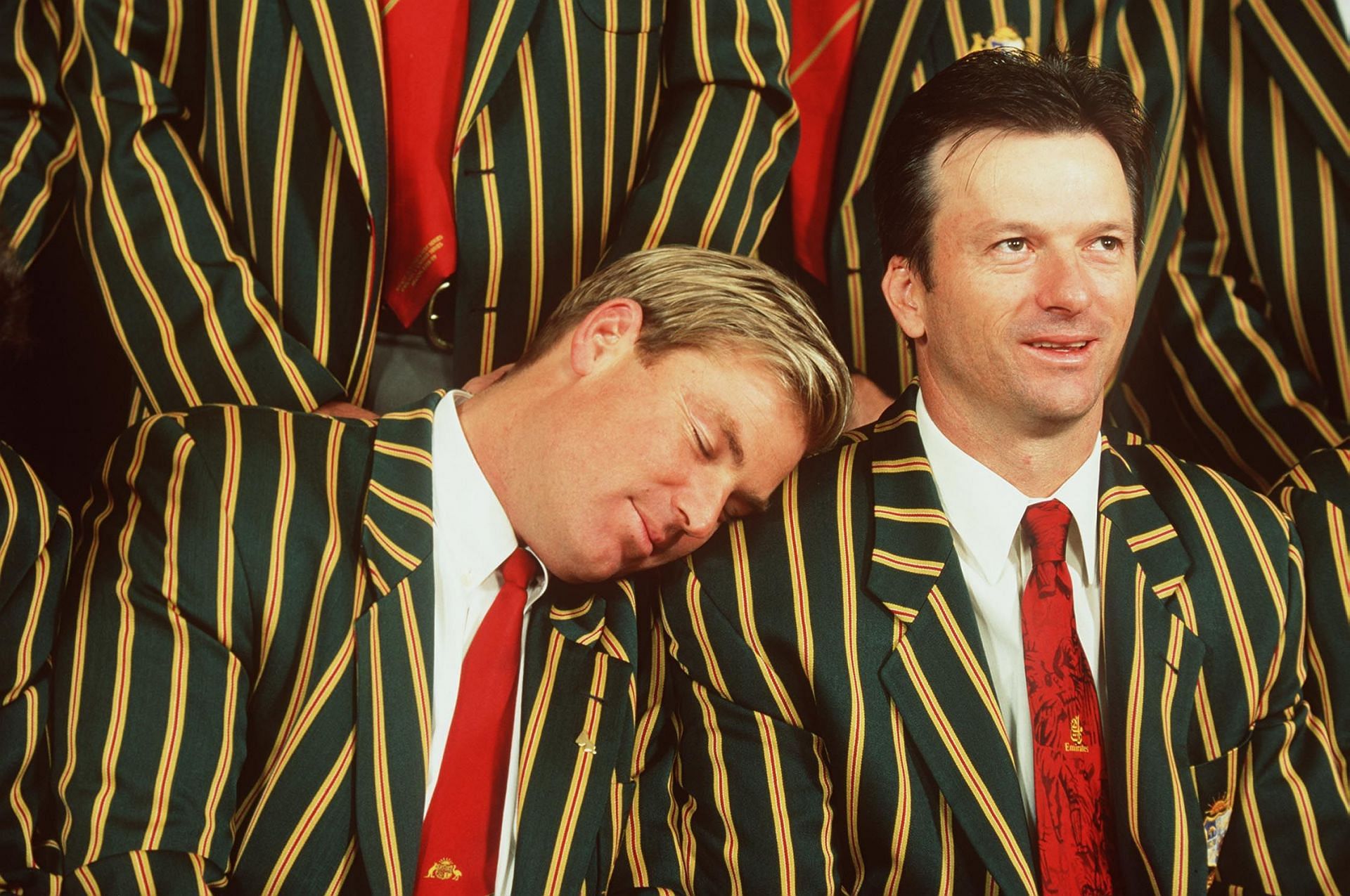 Australian cricketer Shane Warne takes a snooze on the shoulder of Steve Waugh, as the players prepare to pose for the official Australian Cricket Board World Cup team picture at the Crown Casino, Melbourne, Australia. Pic: Getty Images