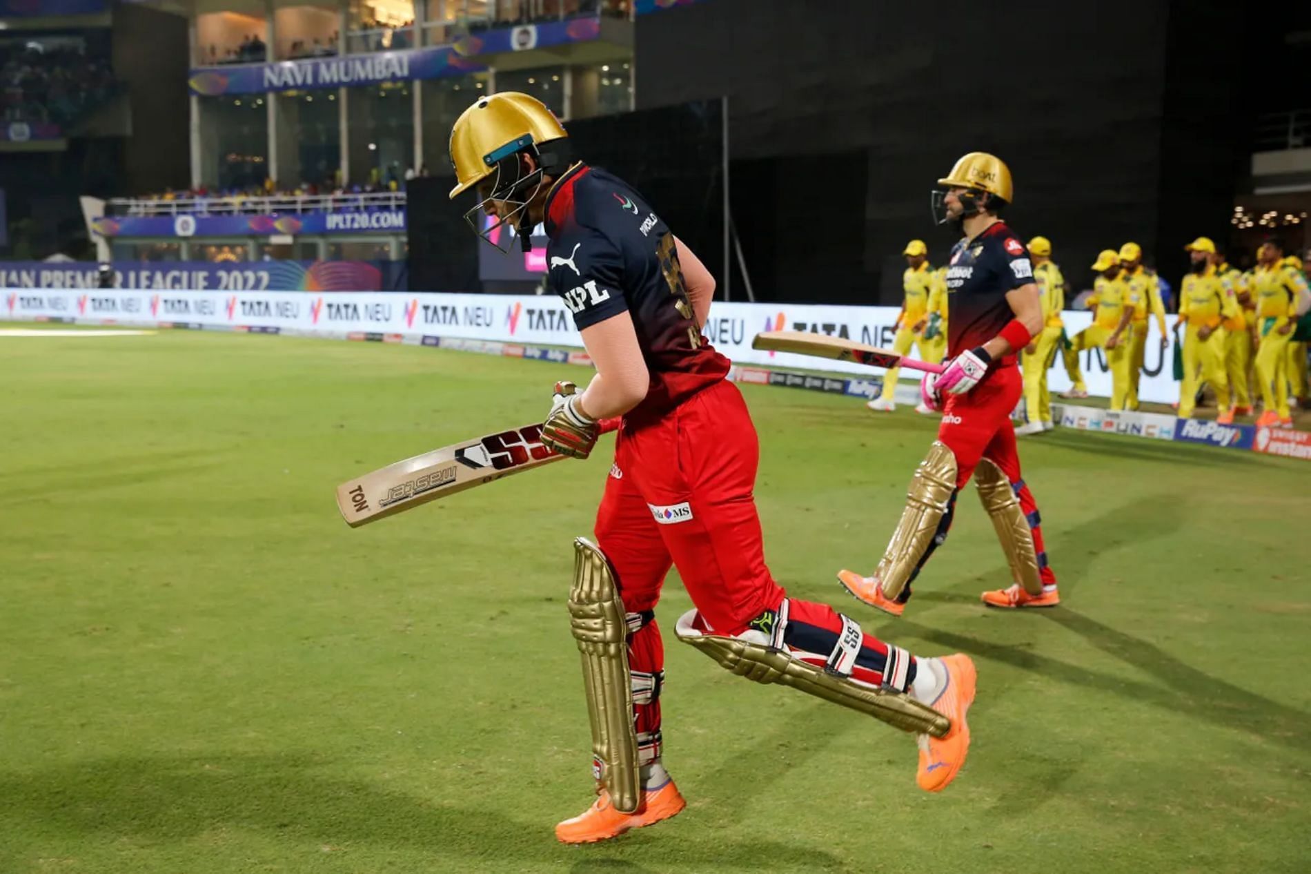 Anuj Rawat (left) going out to bat with Faf du Plessis. Pic: IPLT20.COM