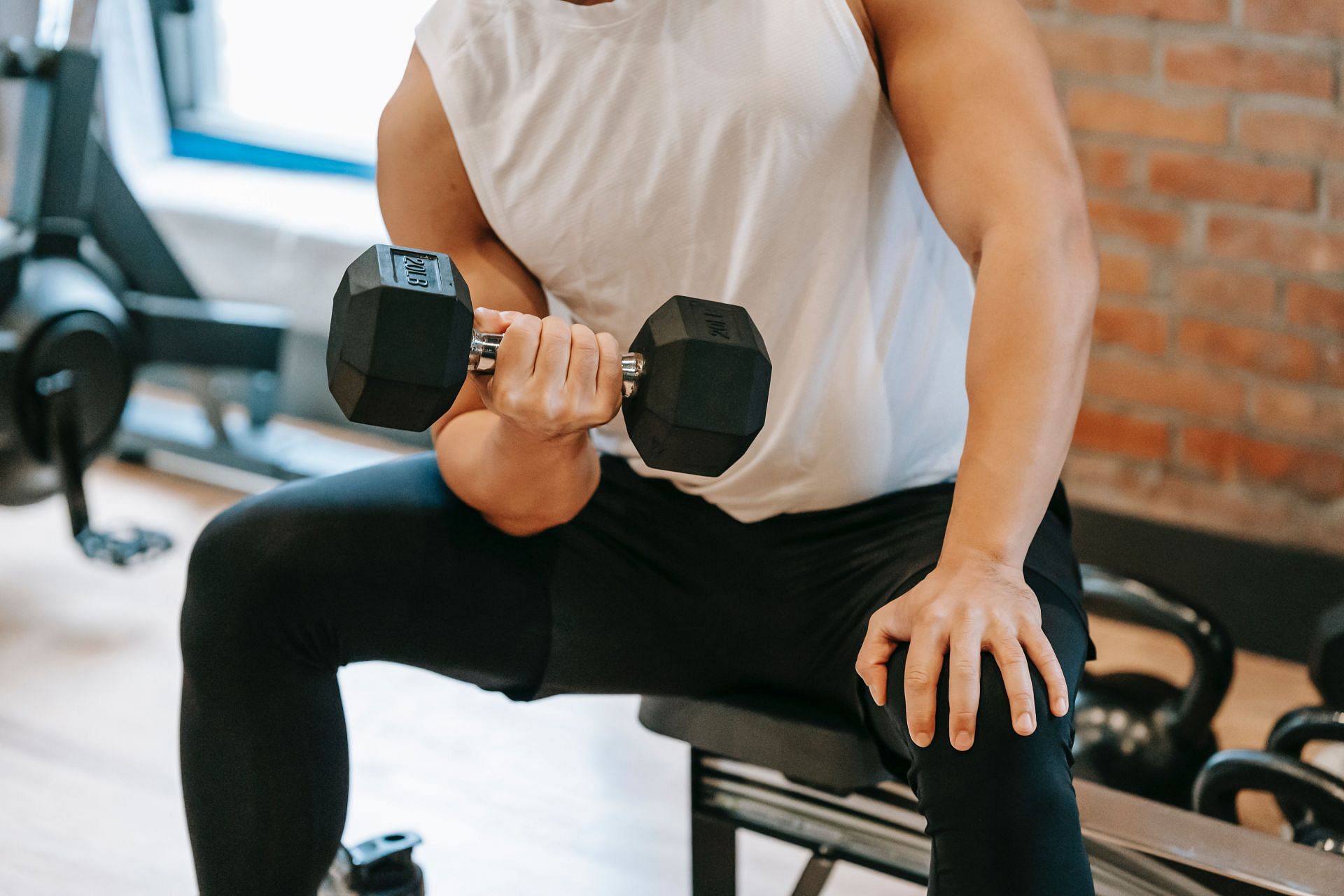 Dumbbells are the most important equipment in your home gym. (Image by Andres Ayrton / Pexels)