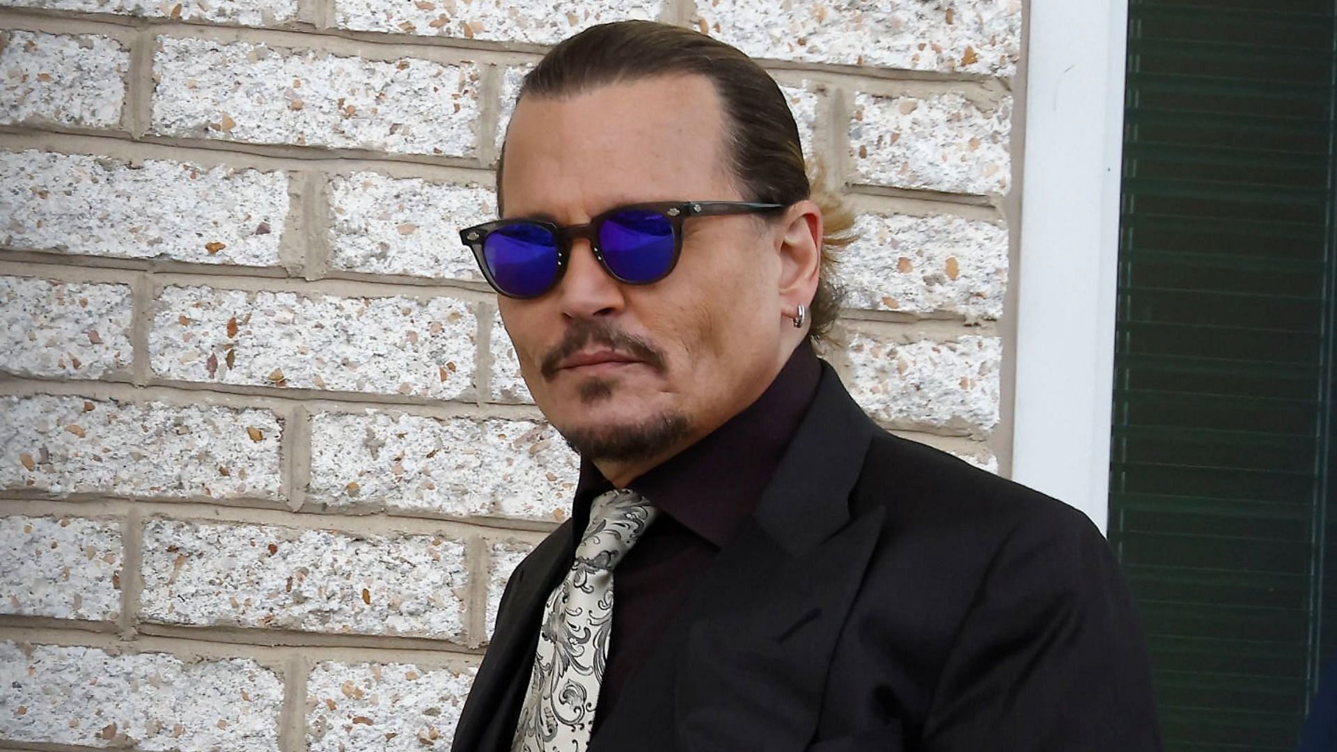 Johnny Depp at his defamation trial against Amber Heard (Image via Paul Morigi/Getty Images)
