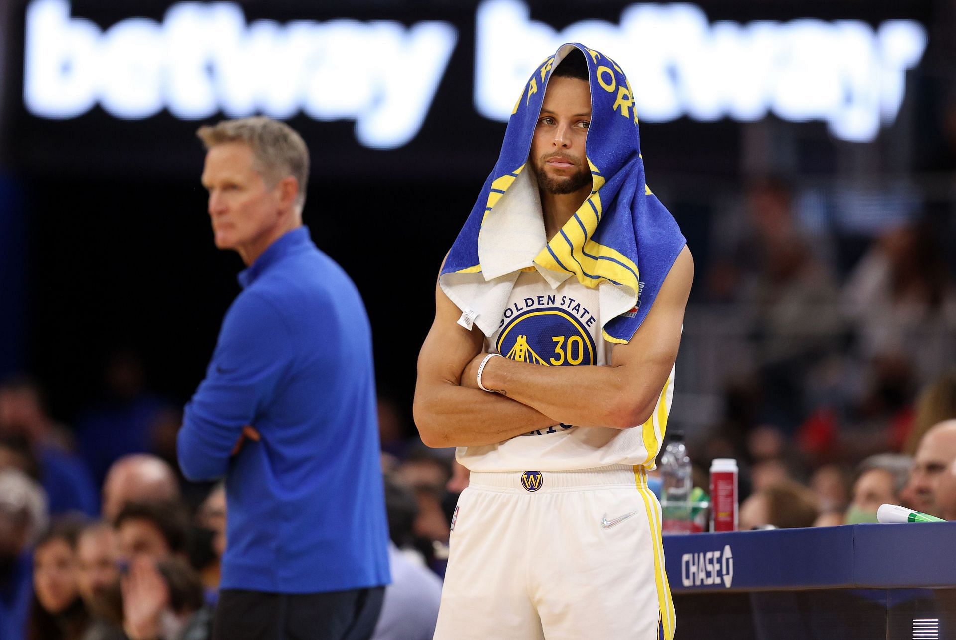 Steph Curry of the Golden State Warriors with head coach Steve Kerr