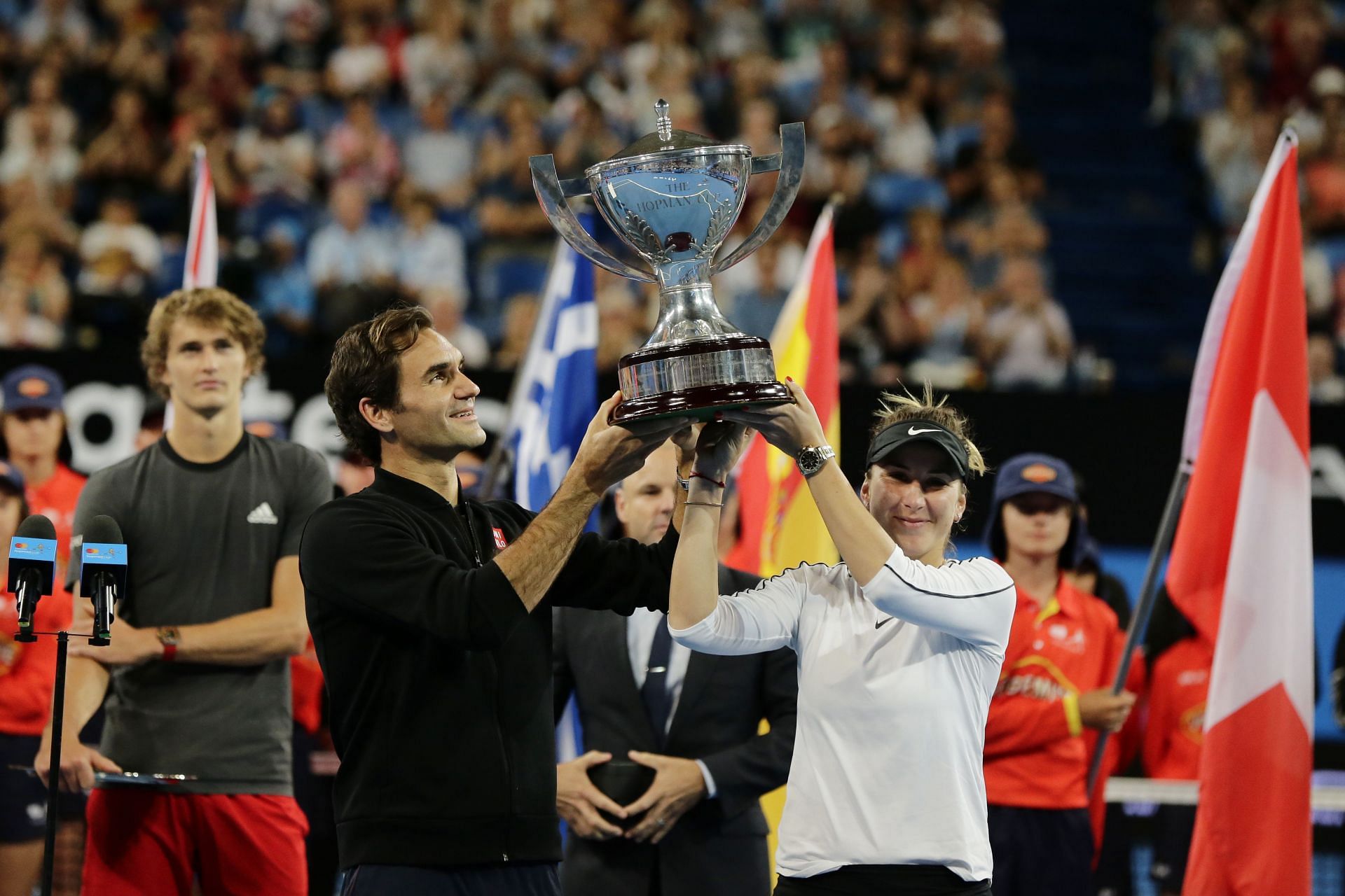 Roger Federer and Belinda Bencic with the 2019 Hopman Cup