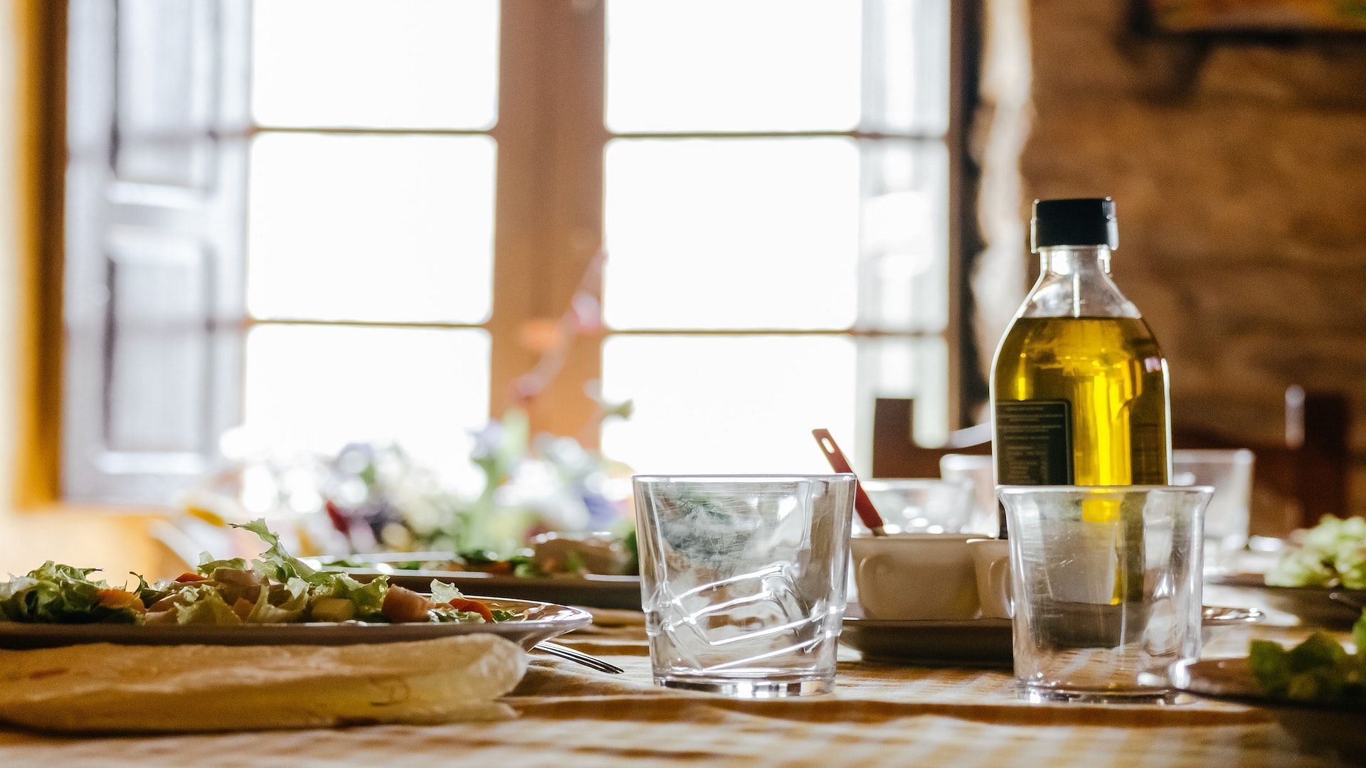 Drizzling food in olive oil makes it richer. Image via Unsplash/Juan Gomez