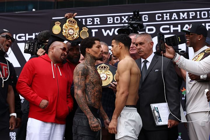 Gervonta Davis pushes Rolly Romero off stage during weigh-ins