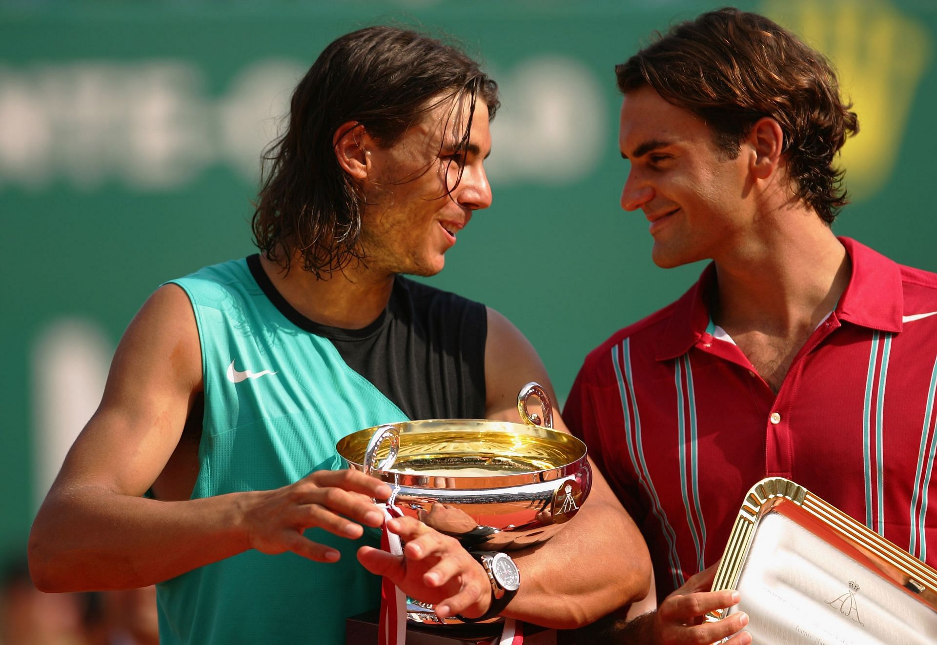 Rafael Nadal and Roger Federer laugh during the trophy ceremony at the 2007 Monte-Carlo Masters