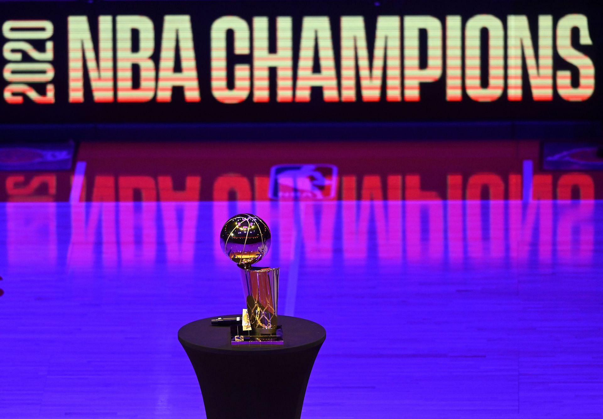 The Larry O&#039;Brien Championship Trophy on display during a banner unveiling ceremony.