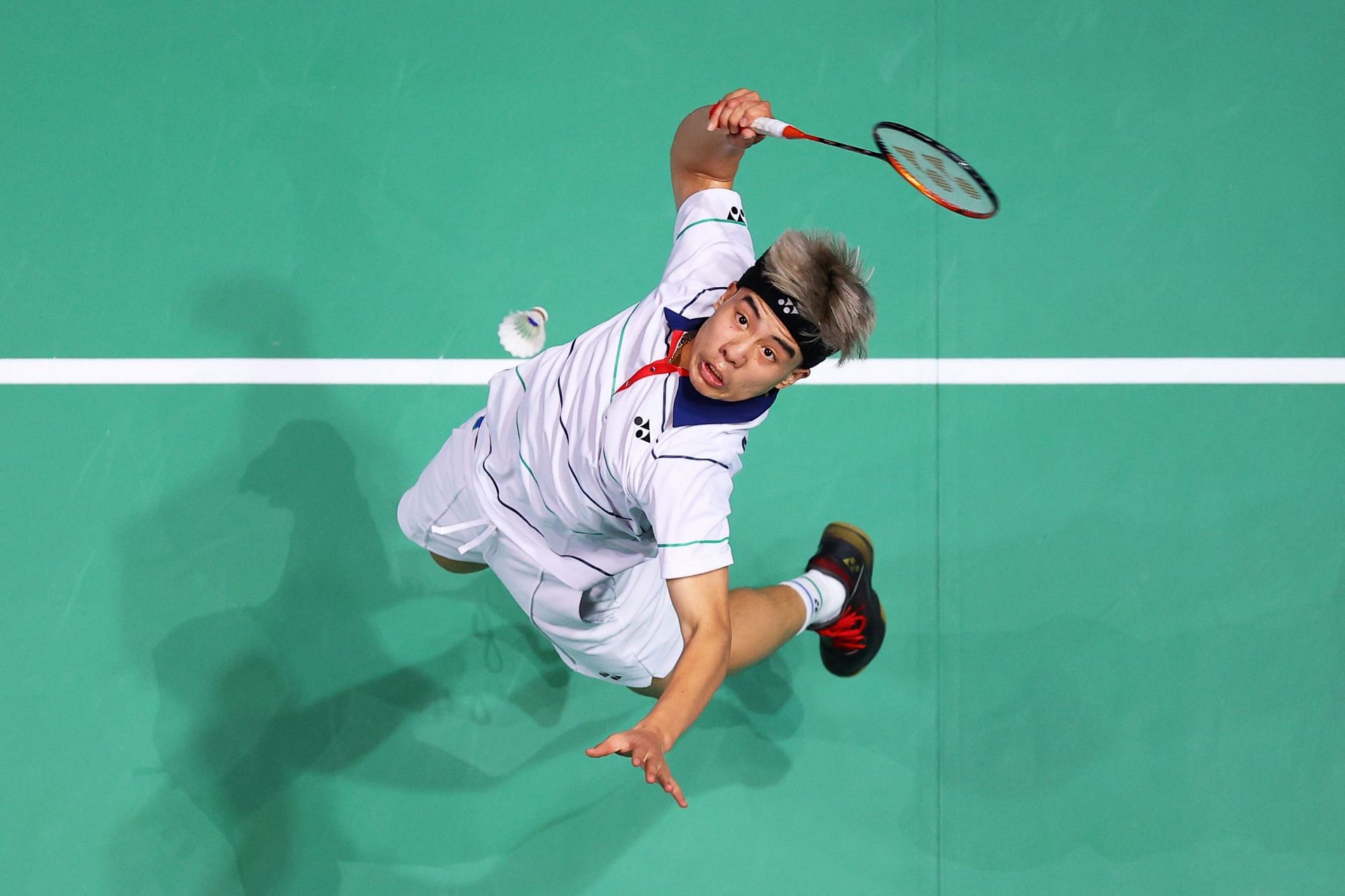 Nhat Nguyen in action at the All England Open Badminton Championships
