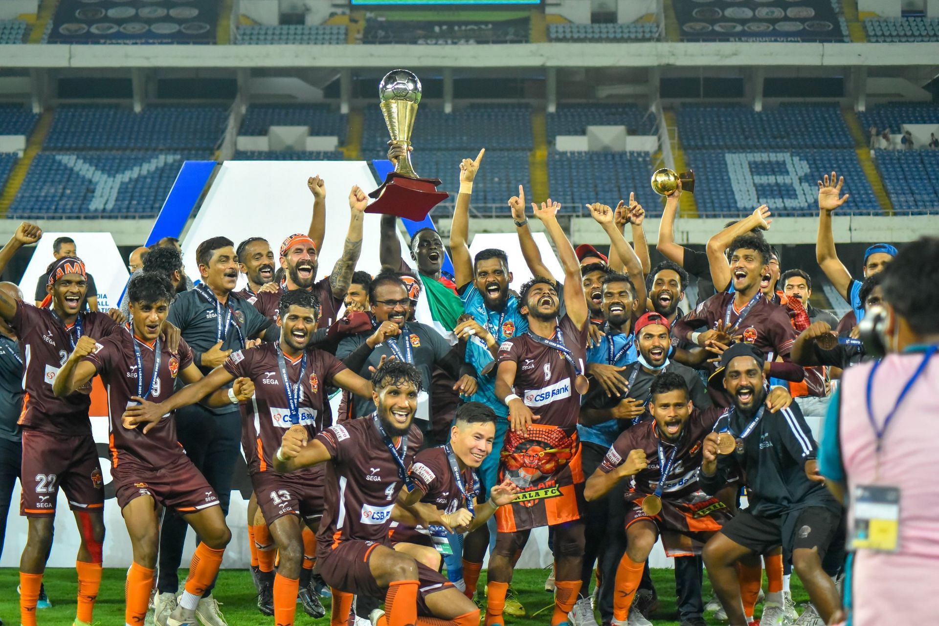 Gokulam Kerala FC players celebrating after winning the I-League 2021-22 trophy. (Image Courtesy: Twitter/GokulamKeralaFC)