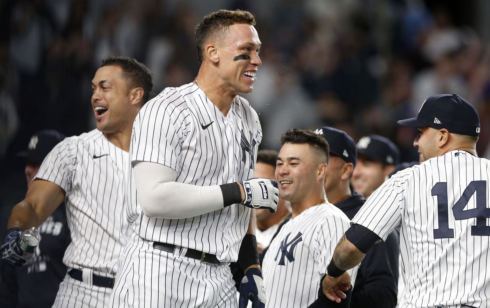The New York Yankees celebrate a walkoff win