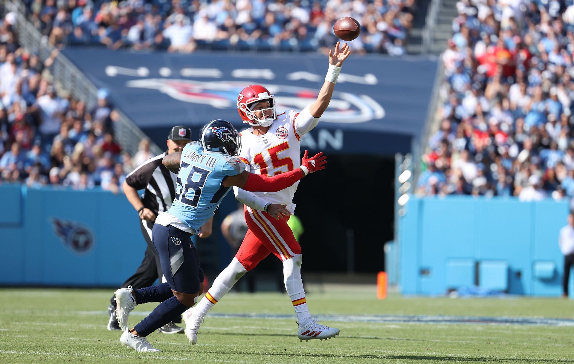 Mahomes narrowly escapes a sack against the Titans
