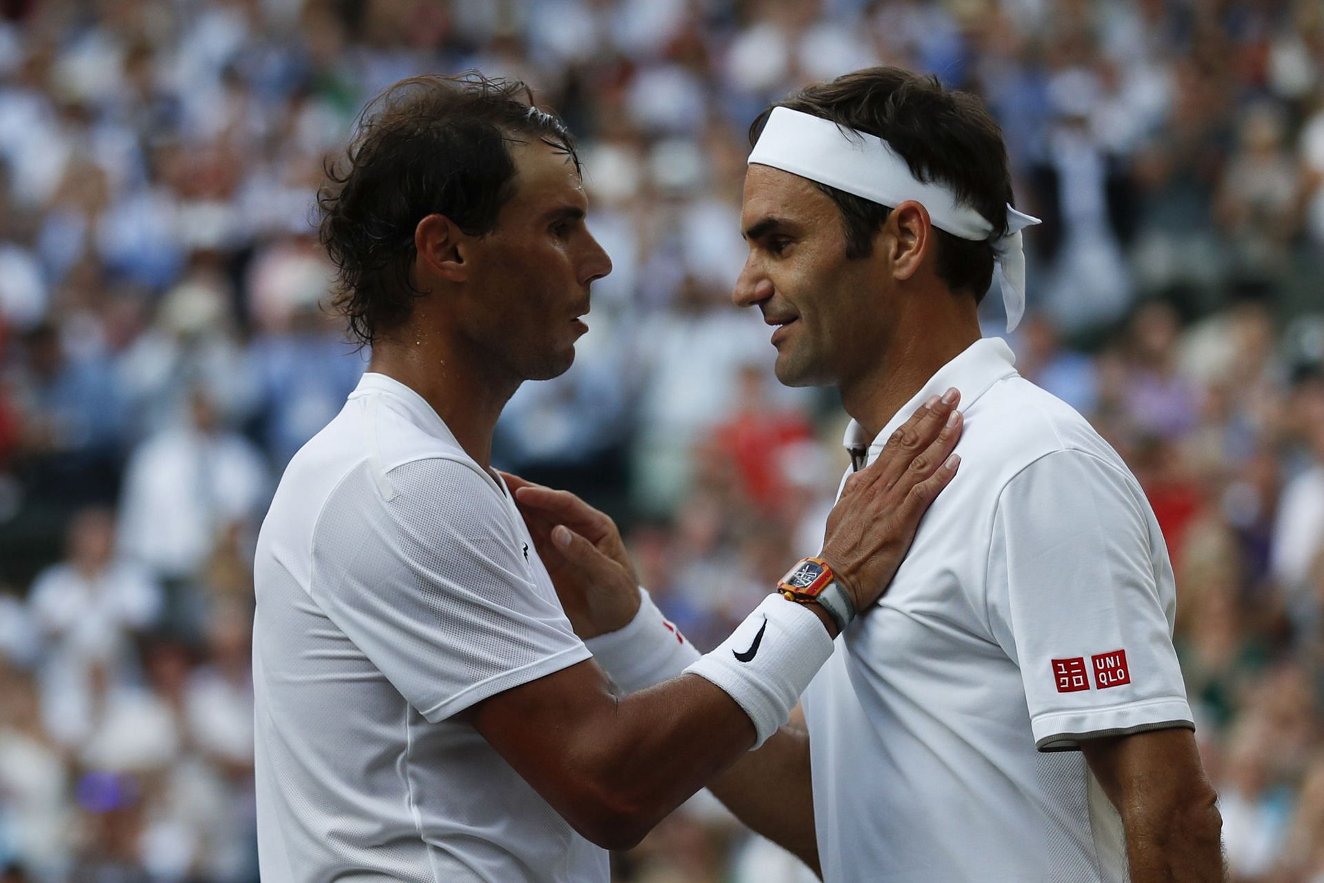 Rafael Nadal congratulates Roger Federer after their match at the 2019 Wimbledon Championships